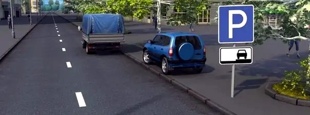 Иллюстрация к вопросу: Разрешено ли водителю грузового автомобиля остановиться в этом месте?